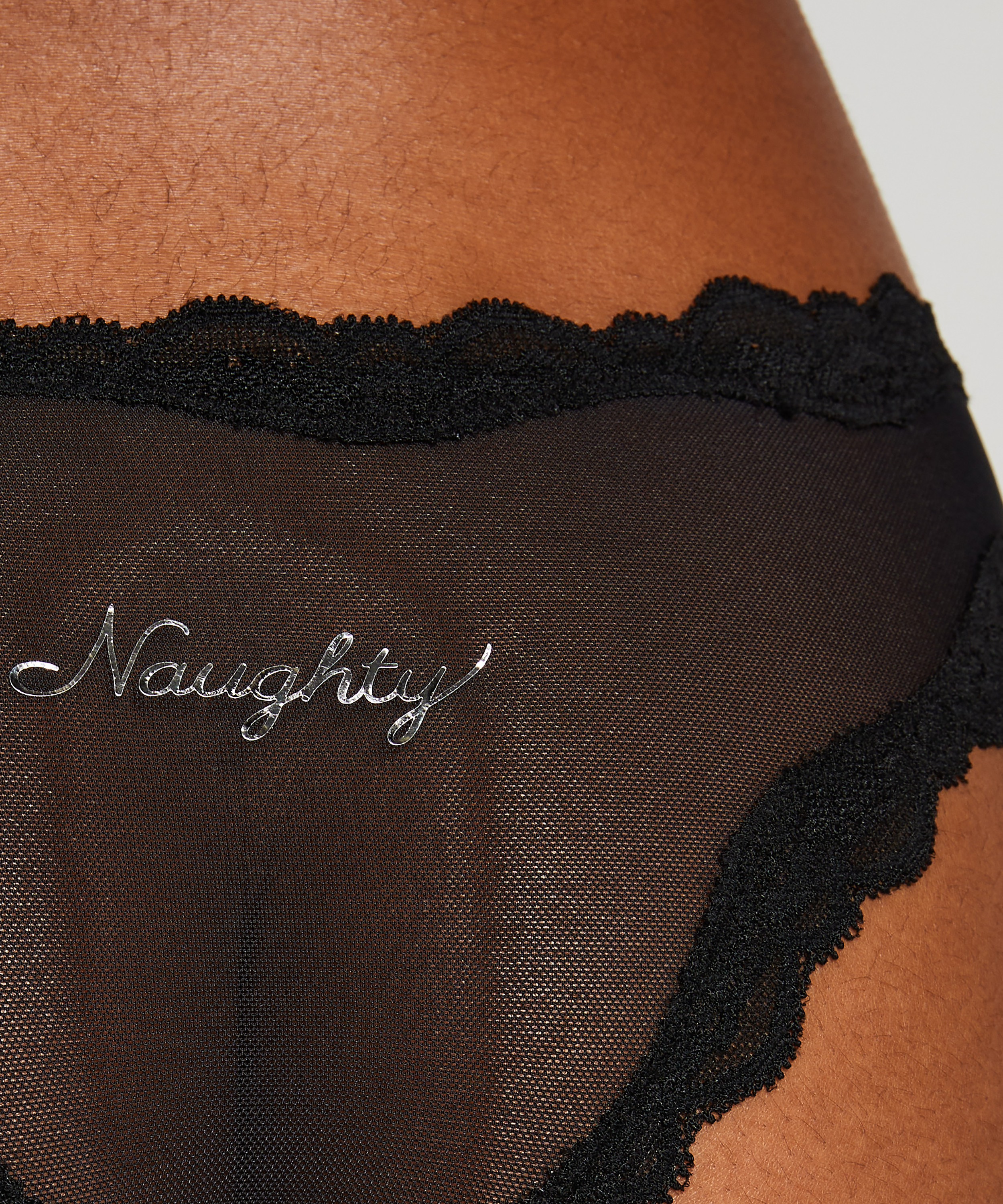 Slip brésilien Astra, Noir, main