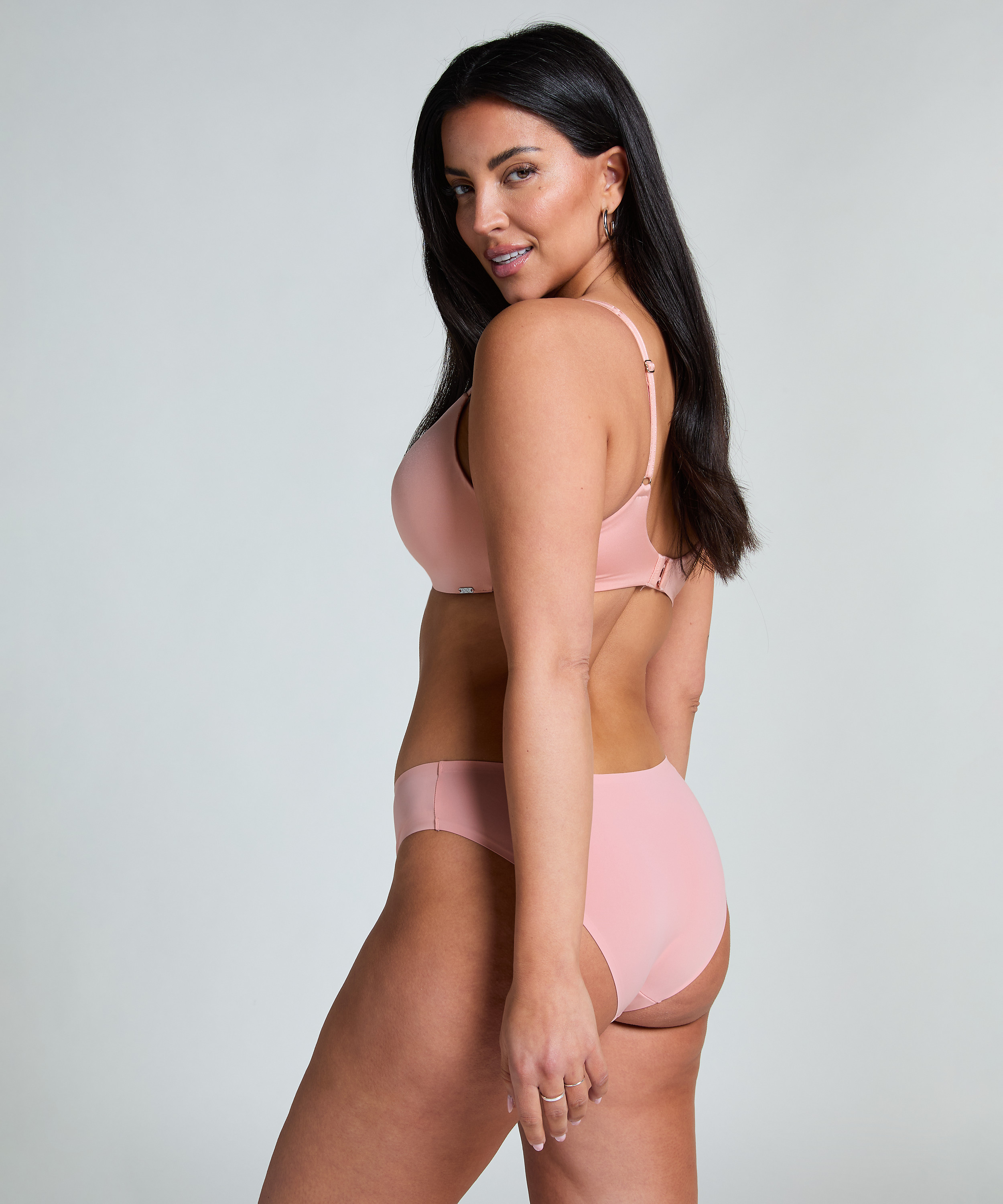 Slip brésilien Invisible, Rose, main