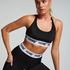 HKMX Soutien-gorge de sport The Crop Logo Level 1, Noir
